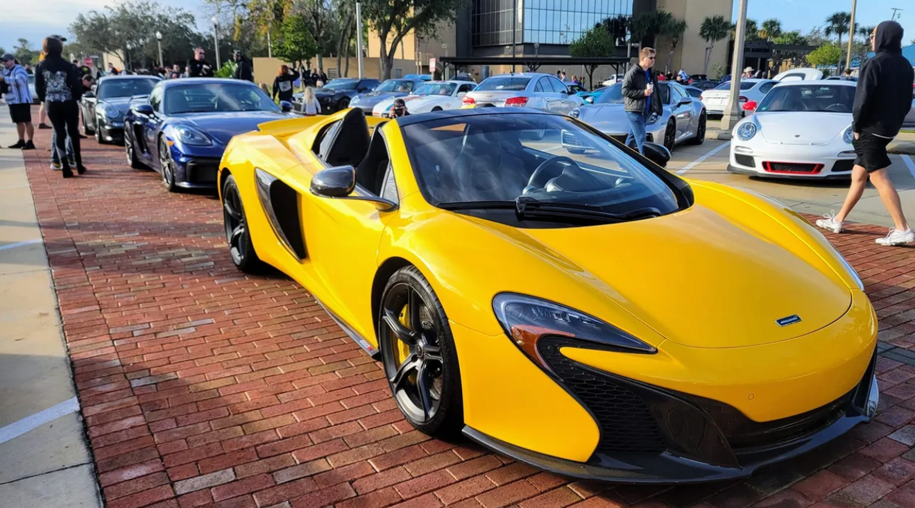 Luxury cars line road as part of Orlando Cars & Coffee