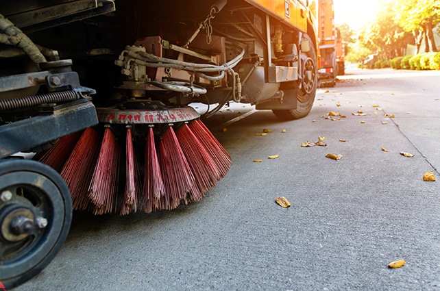 image of Street sweepers cleaning city street